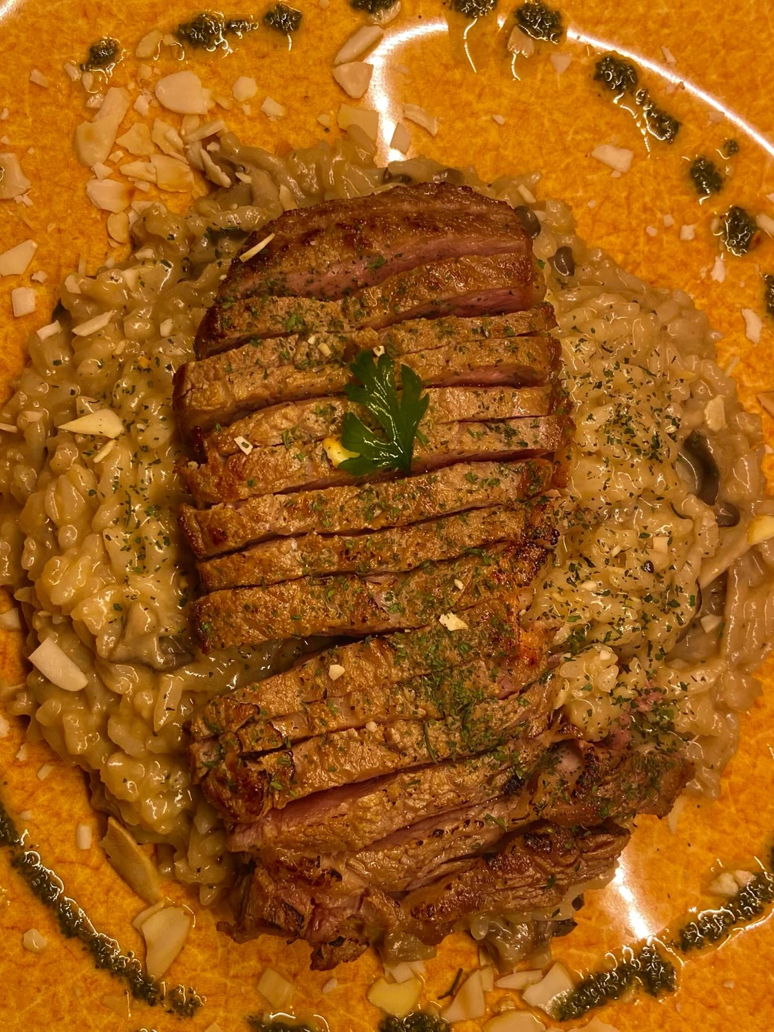 Controfiletto al Funghi com risotto de cogumelos