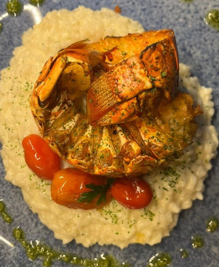Cauda de lagosta com risotto e tomates confit